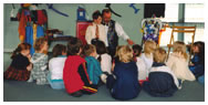 Russell King, magician, entertaining school children